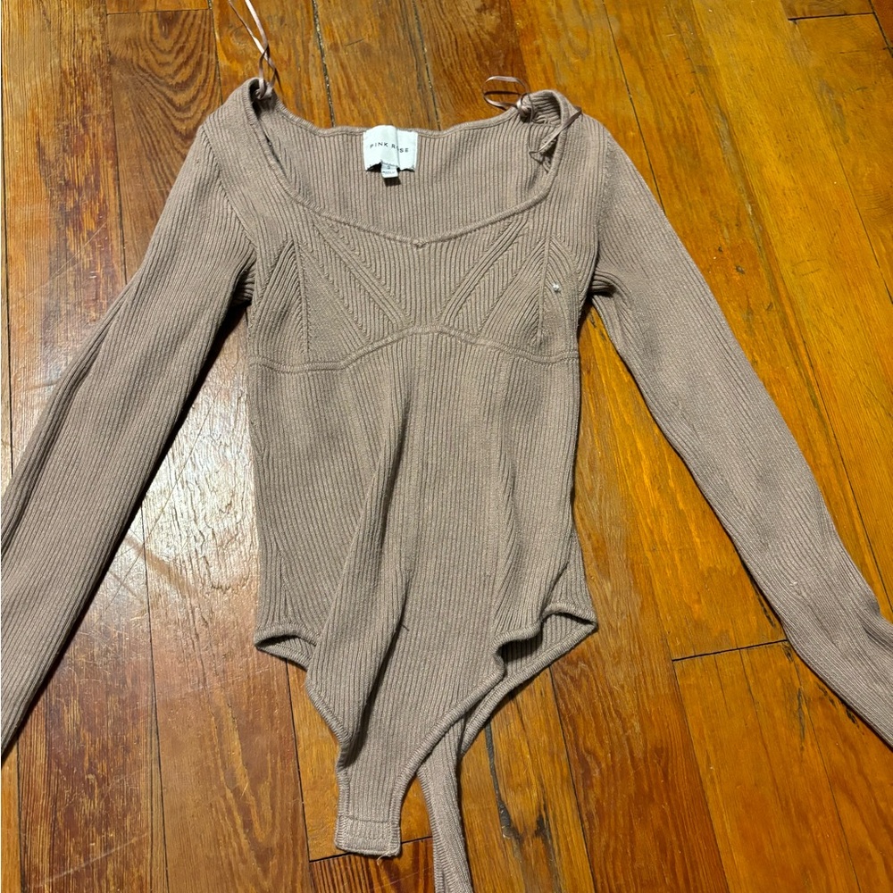 Tan body suit